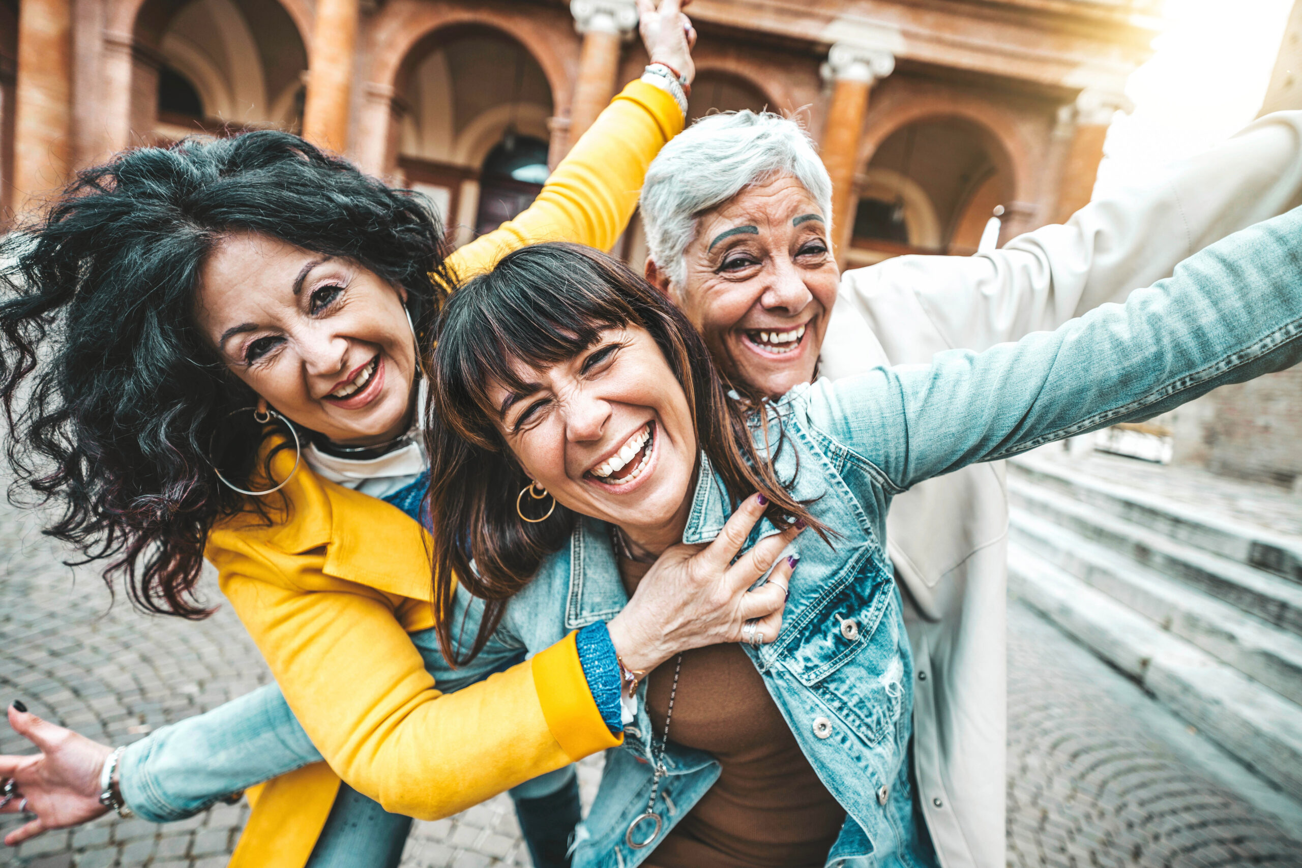 A group of older women enjoy life with a senior checking account.