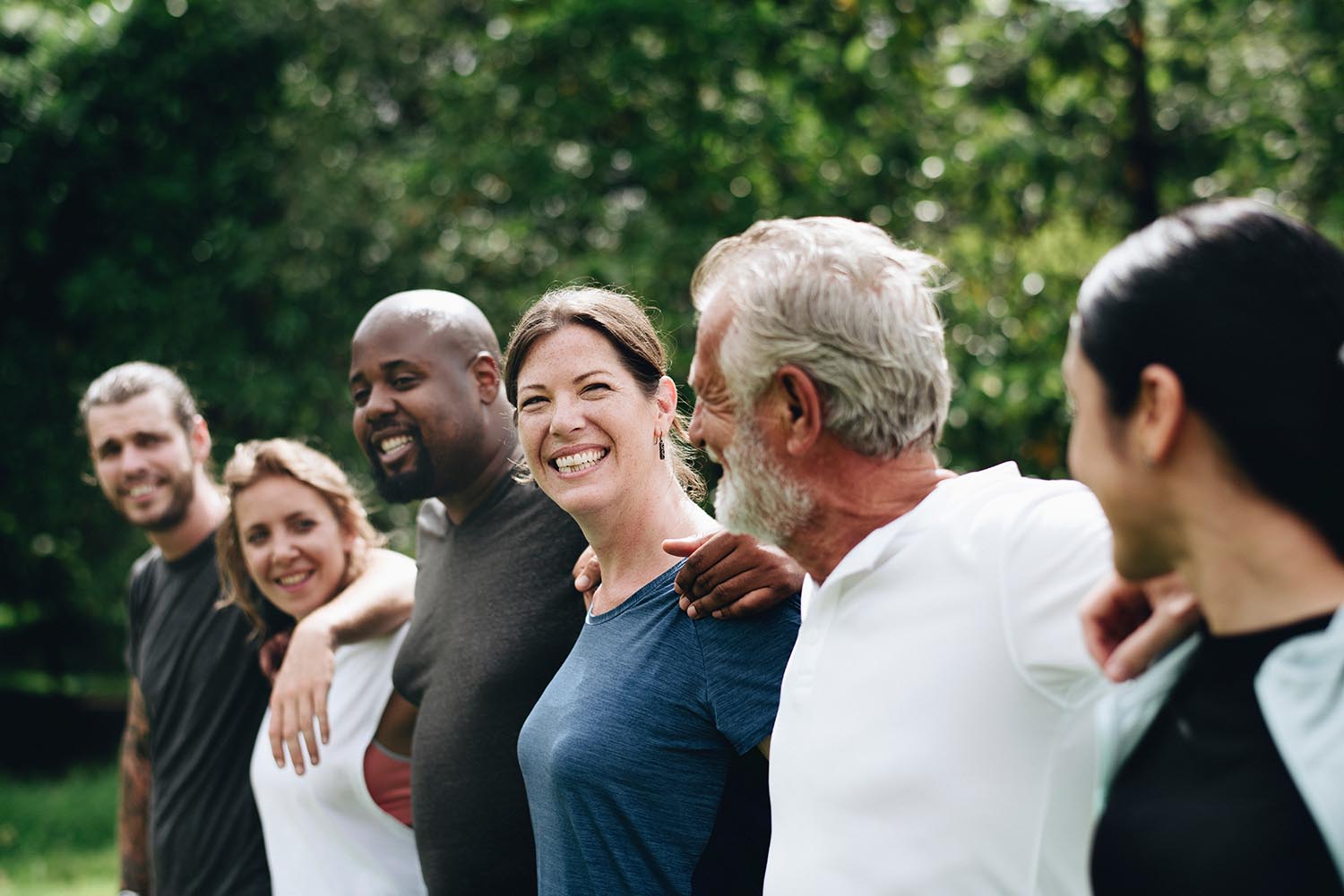 A group of people smiling after after joining Bowater Credit Union.