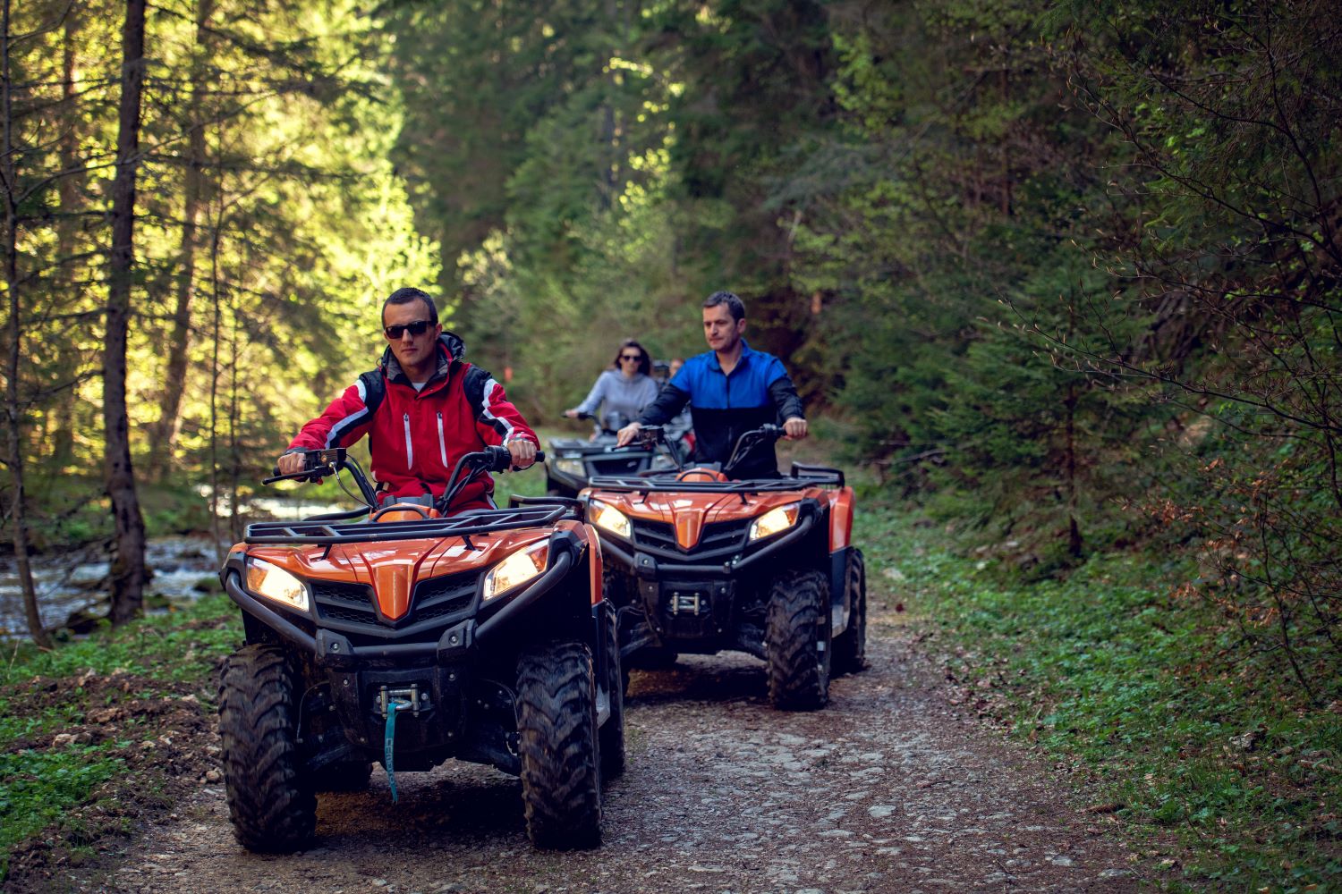 A group of ATV riders explore offroad